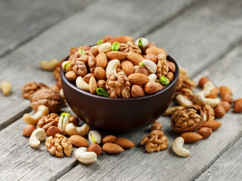 wooden-bowl-with-mixed-nuts-wooden-gray-surface-2048x1366